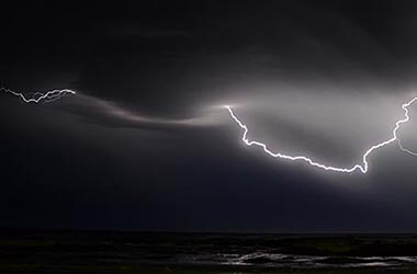 lightning in darkened sky